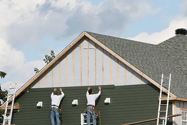 Professional Siding Installation technician working in New Paris, IN